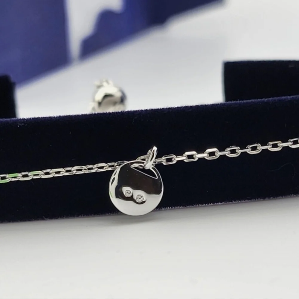 NIB Swarovski Simple Rhodium Adjustable Disc Chain Slide Bracelet